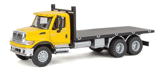 Walthers SceneMaster HO International 7600 3-Axle Flatbed Truck - Yellow Cab, Black Flatbed