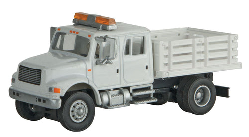 Walthers SceneMaster Inter 4900 Open Stake Bed Utility Truck - White w/Railroad MOW Logo Decals