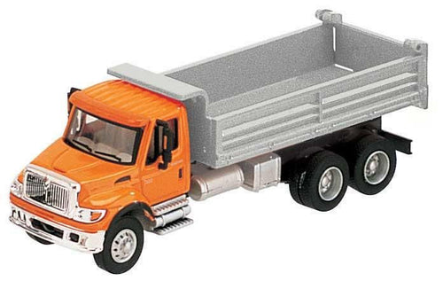 Walthers SceneMaster International 7600 3-Axle Heavy-Duty Dump Truck - Orange Cab Silver Dump Body
