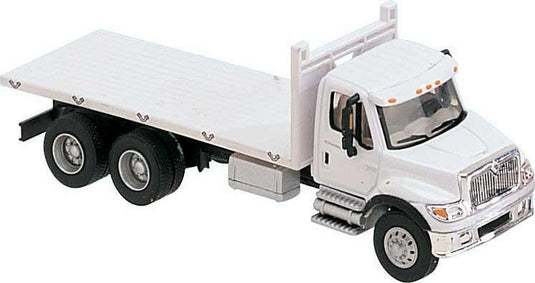 Walthers SceneMaster HO International 7600 3-Axle Flatbed Truck - White with Railroad Maintenance-of-Way Logo Decals